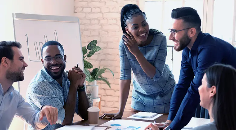 Group of employees developing a project for a startup